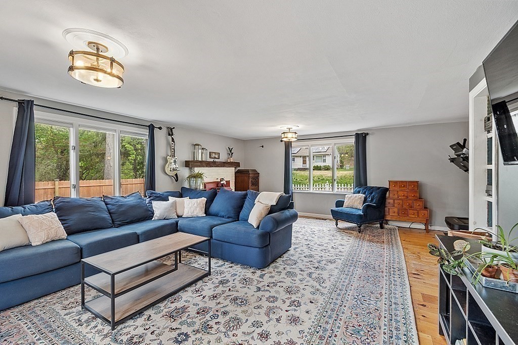 131 Lawrence Road Haverhill, MA 01835 - Photo 24 of 39 a living room with furniture and a large window