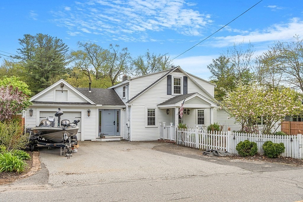 131 Lawrence Road Haverhill, MA 01835 - Photo 3 of 39 a house view with a garden space
