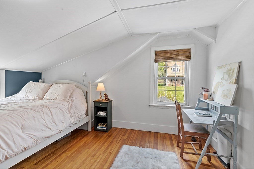 131 Lawrence Road Haverhill, MA 01835 - Photo 35 of 39 a bedroom with a bed and a window