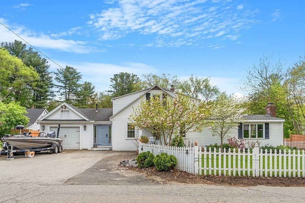 131 Lawrence Road Haverhill, MA 01835 - Photo 4 of 39 a car parked in front of a house