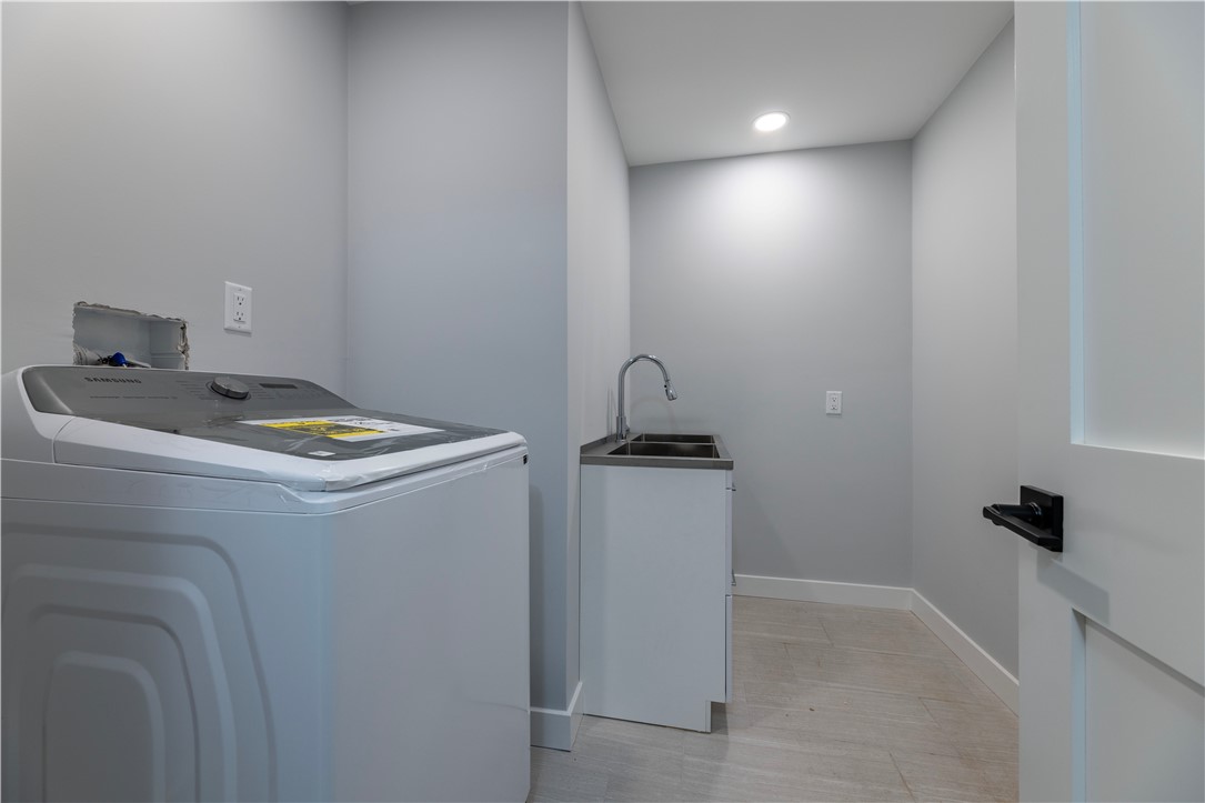 1 Stoneridge Road, Unit 1 Smithfield, RI 02917 - Photo 34 of 38 Second floor Laundry