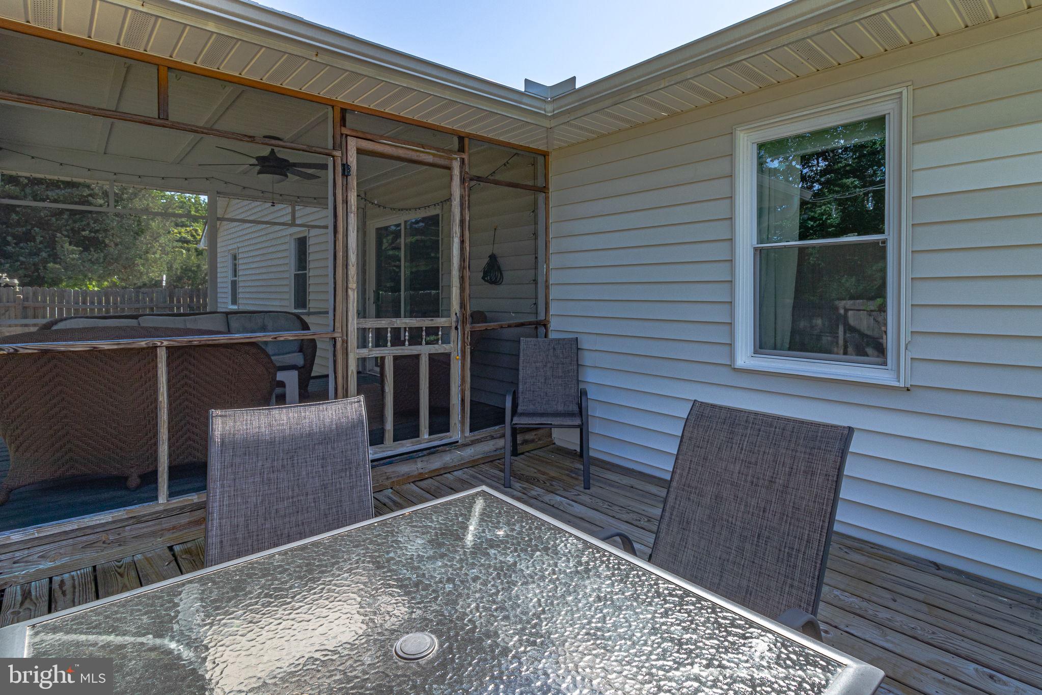 9832 River Road Lancaster, VA 22503 - Photo 55 of 68 Charming screened porch retreat.