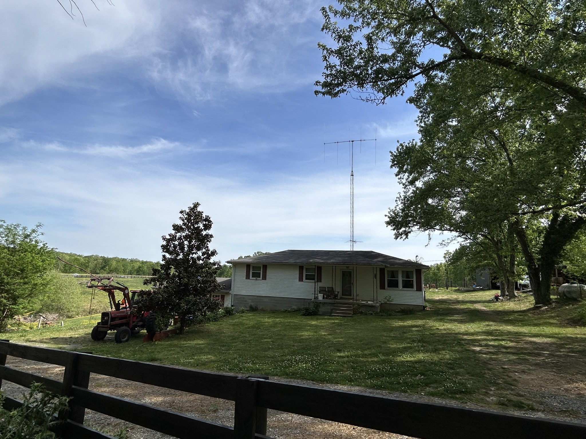 7810 Oscar Green Road Primm Springs, TN 38476 - Photo 13 of 13 a front view of a house with a yard
