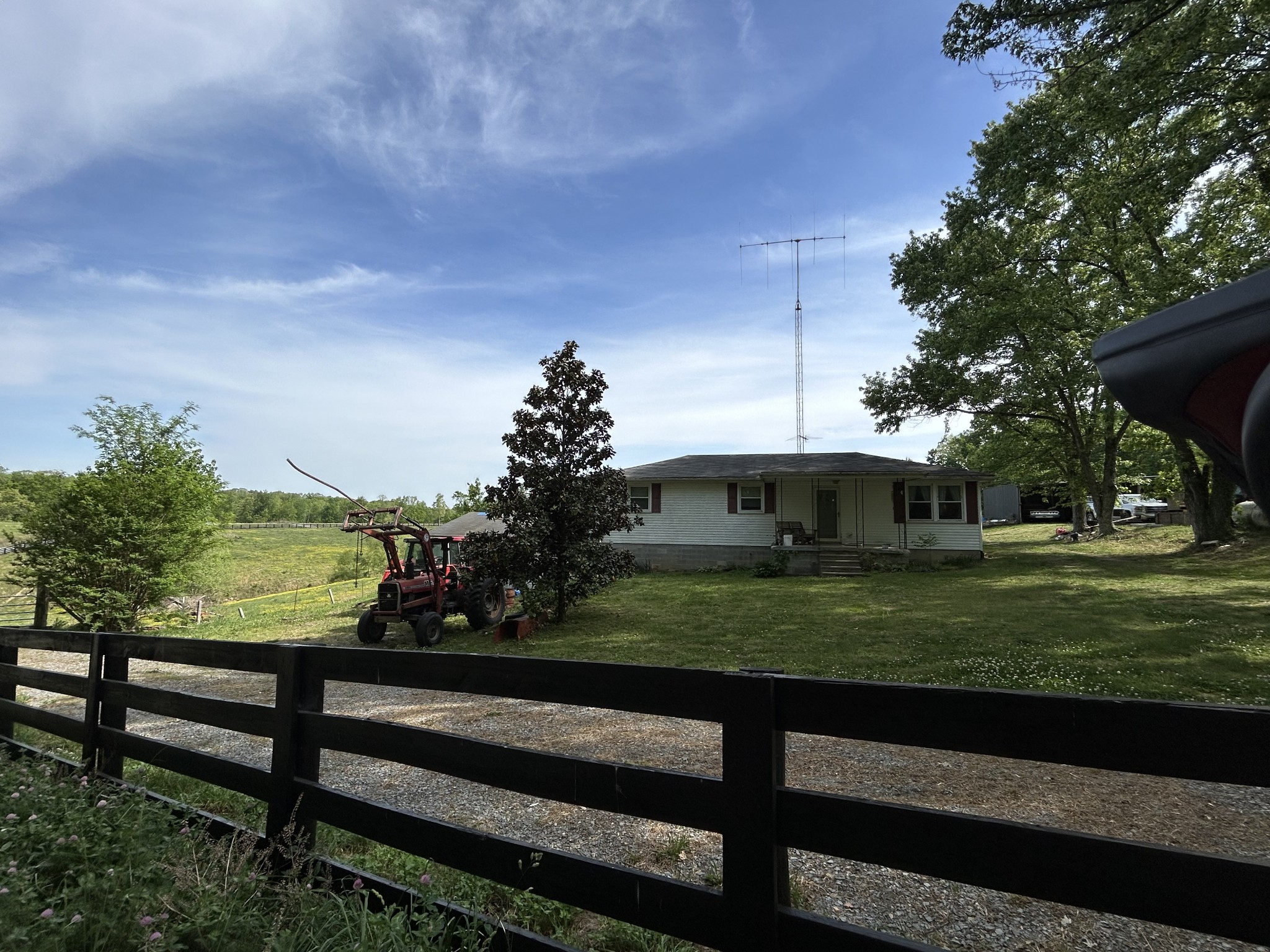 7810 Oscar Green Road Primm Springs, TN 38476 - Photo 10 of 13 a view of a wooden bench and trees in the background