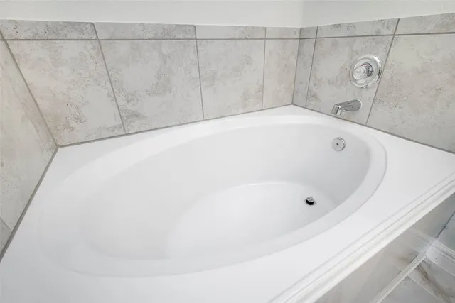 a bathroom with a bathtub