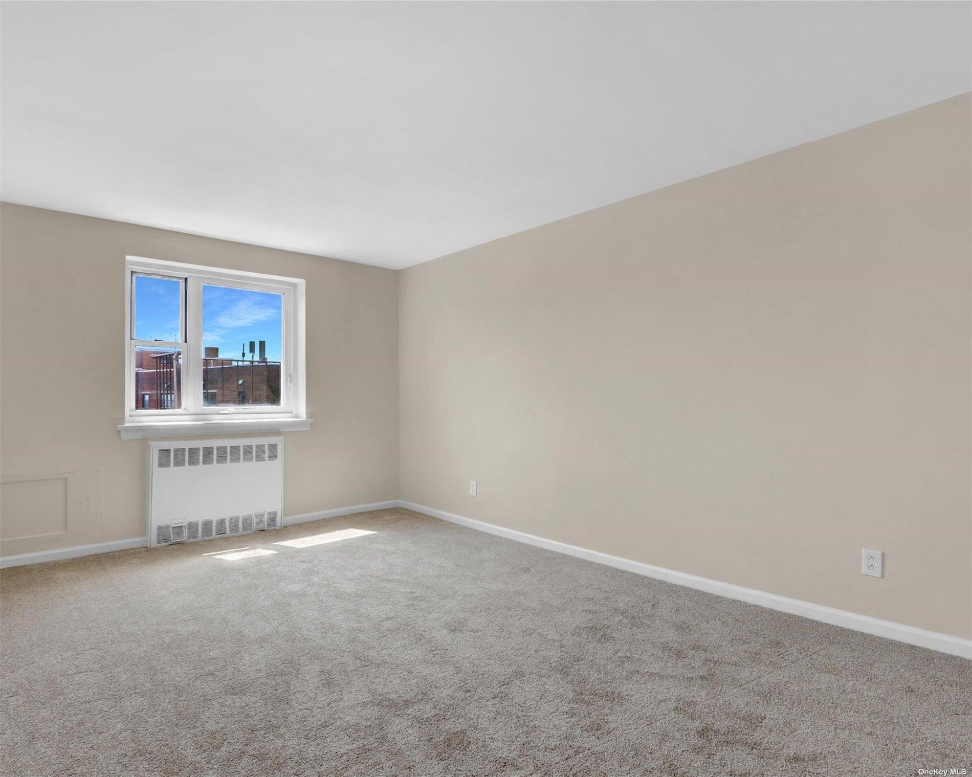 151-31 88th Street, Unit 6H Queens, NY 11414 - Photo 15 of 20 an empty room with windows and closet