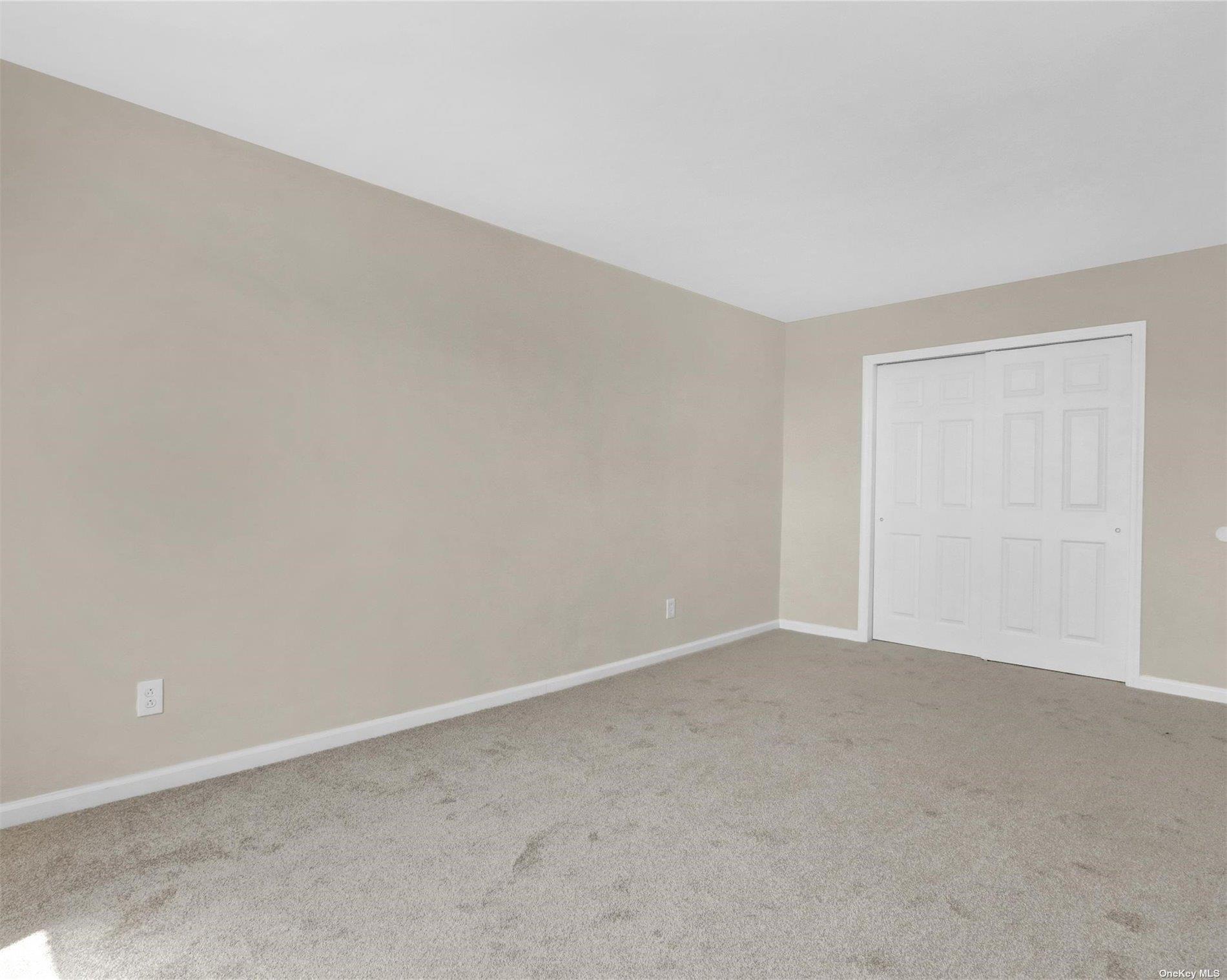 151-31 88th Street, Unit 6H Queens, NY 11414 - Photo 16 of 20 an empty room with an entryway