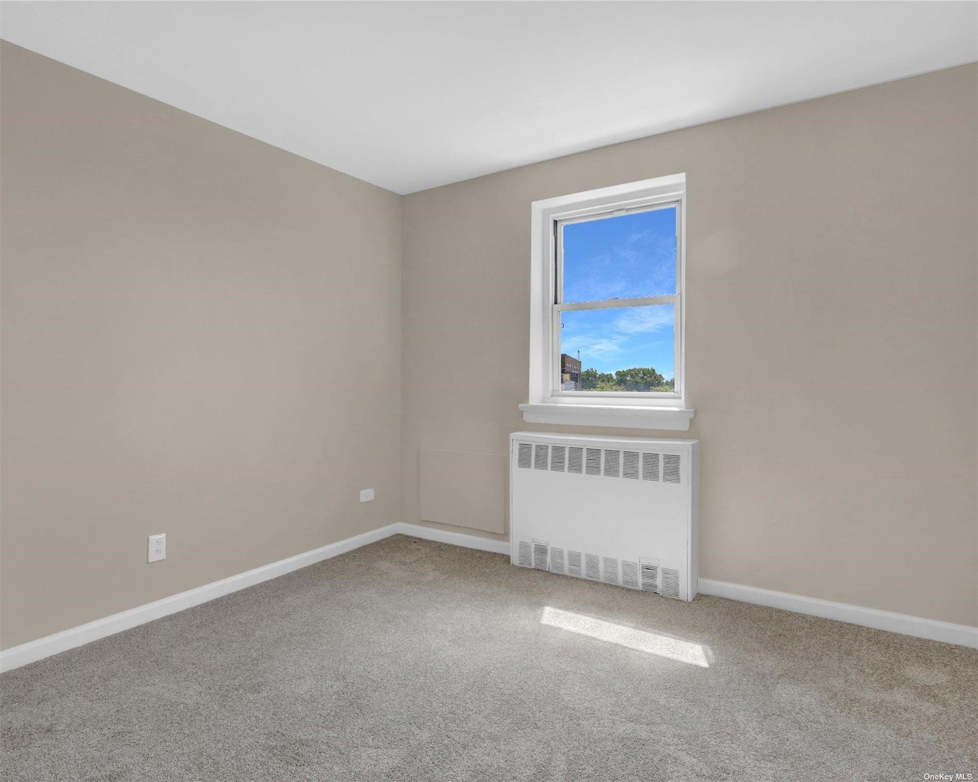 151-31 88th Street, Unit 6H Queens, NY 11414 - Photo 18 of 20 an empty room with windows