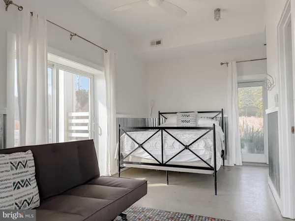a bedroom with a bed and a cabinets