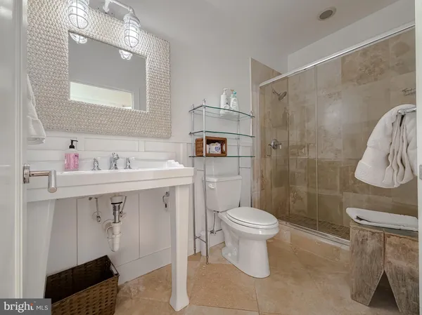a bathroom with a sink and a bathtub