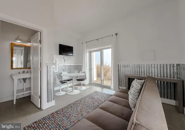 a bedroom with a bed and a cabinets