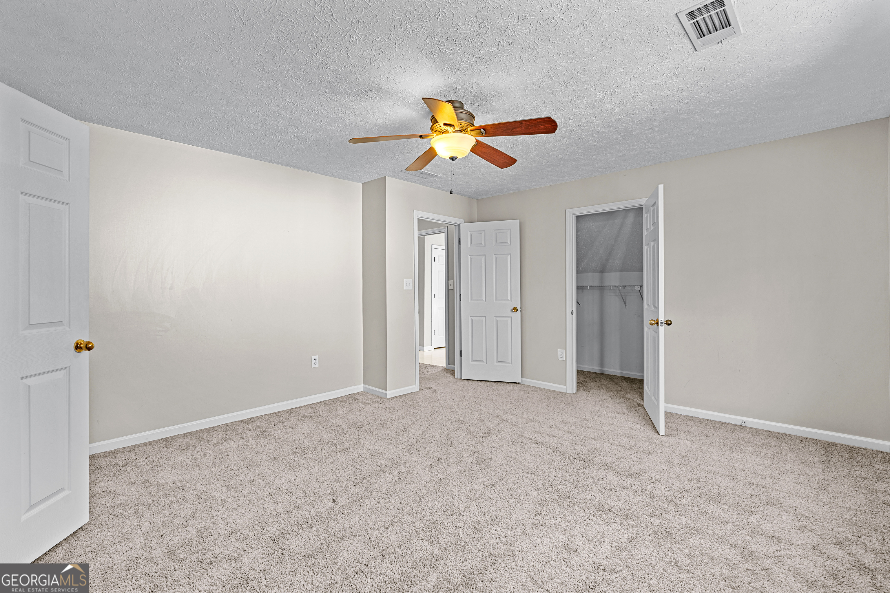 19 Rayner Drive Newnan, GA 30265 - Photo 30 of 53 a view of a room with a ceiling fan and window