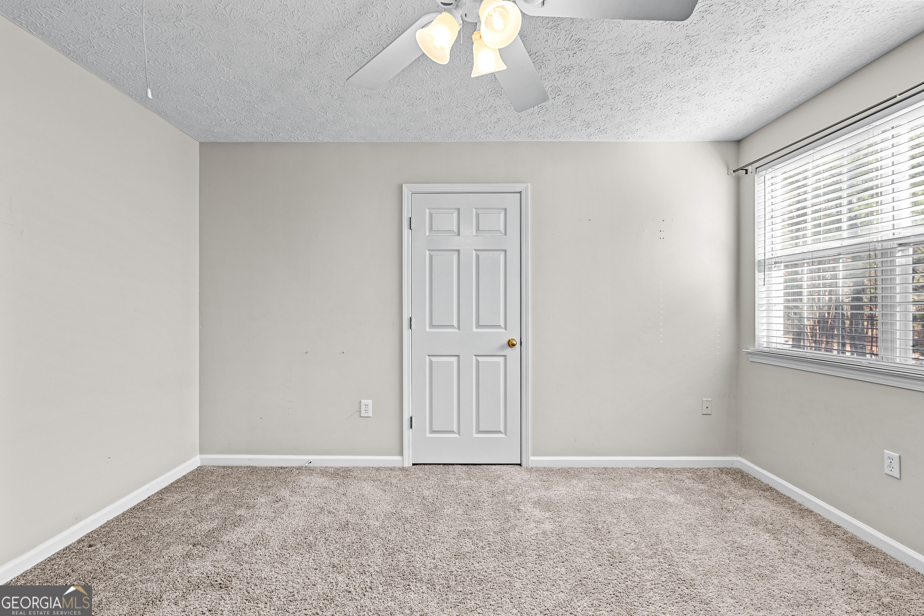 19 Rayner Drive Newnan, GA 30265 - Photo 36 of 53 an empty room with windows