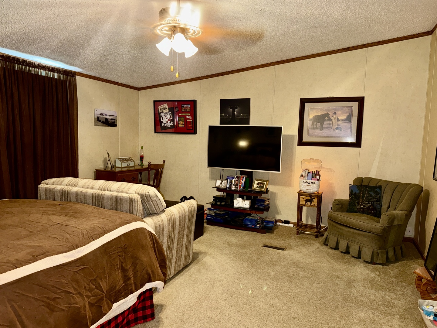 2025 Central Hill Road Grantsburg, IL 62943 - Photo 12 of 31 a bedroom with furniture and a flat screen tv