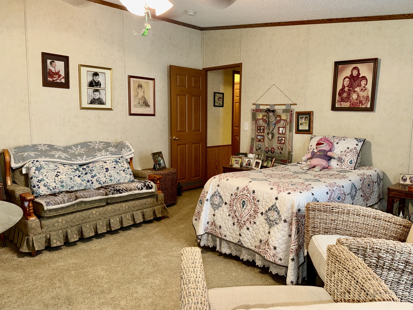 2025 Central Hill Road Grantsburg, IL 62943 - Photo 16 of 31 a bedroom with a bed and a couch