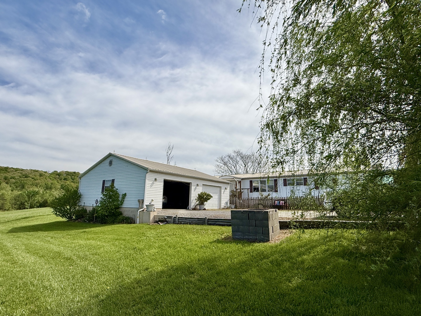 2025 Central Hill Road Grantsburg, IL 62943 - Photo 29 of 31 a view of a house with backyard