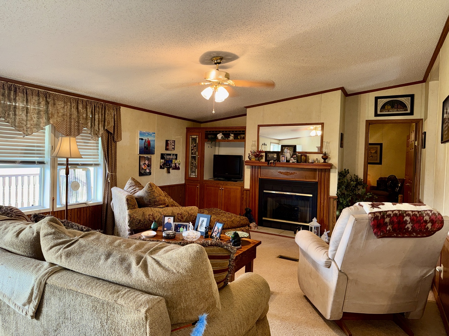 2025 Central Hill Road Grantsburg, IL 62943 - Photo 7 of 31 a living room with furniture fireplace and flat screen tv