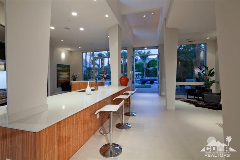 1 Mirada Circle Rancho Mirage, CA 92270 - Photo 11 of 29 a large kitchen with stainless steel appliances lots of counter space and furniture