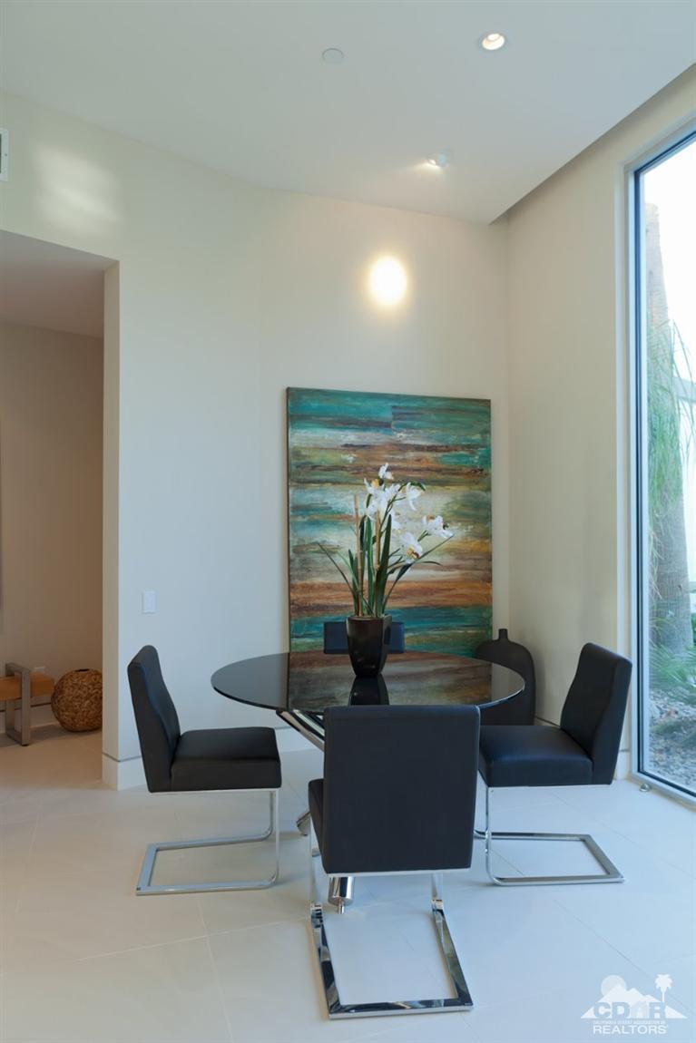 1 Mirada Circle Rancho Mirage, CA 92270 - Photo 15 of 29 a living room with furniture and a flat screen tv