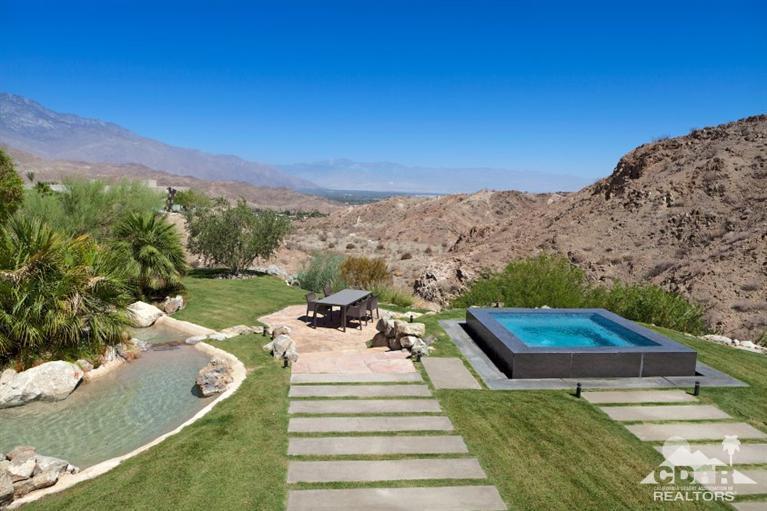 1 Mirada Circle Rancho Mirage, CA 92270 - Photo 2 of 29 a view of a lake with a mountain in the background