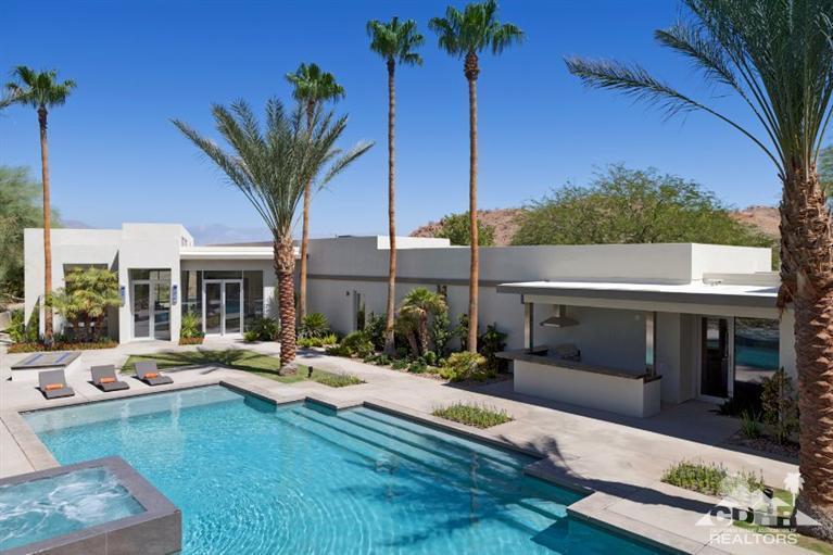 1 Mirada Circle Rancho Mirage, CA 92270 - Photo 22 of 29 a view of a house with backyard and swimming pool