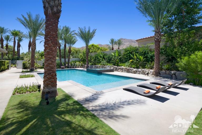 1 Mirada Circle Rancho Mirage, CA 92270 - Photo 23 of 29 a swimming pool with outdoor seating and yard