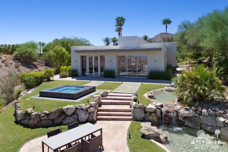 1 Mirada Circle Rancho Mirage, CA 92270 - Photo 25 of 29 a front view of house with yard and outdoor seating
