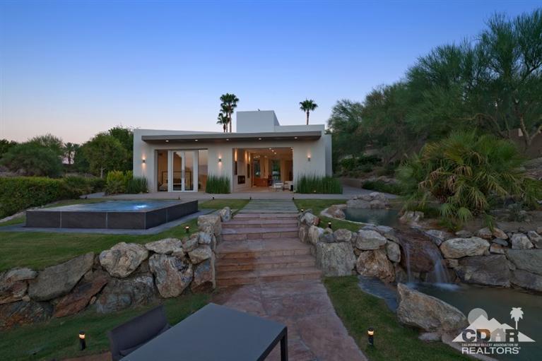 1 Mirada Circle Rancho Mirage, CA 92270 - Photo 26 of 29 a front view of a house with a yard