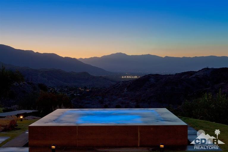 1 Mirada Circle Rancho Mirage, CA 92270 - Photo 4 of 29 a view of patio with a table under an umbrella