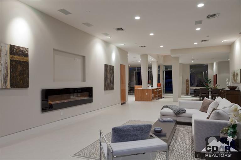 1 Mirada Circle Rancho Mirage, CA 92270 - Photo 8 of 29 a living room with furniture and a fireplace