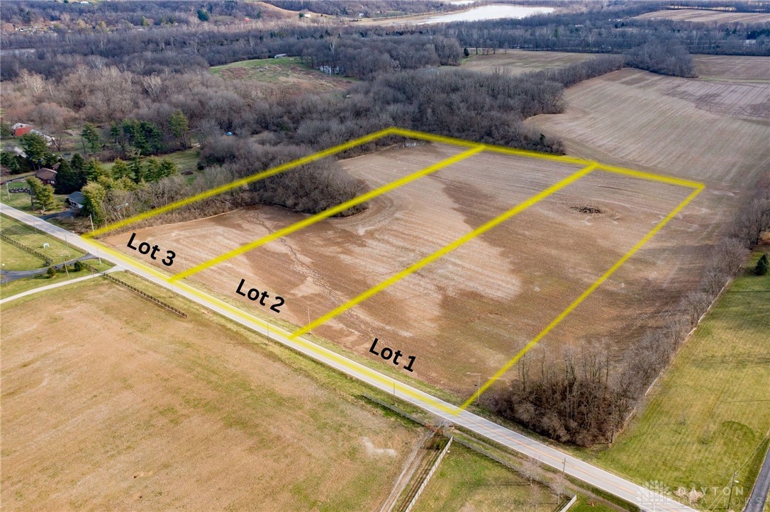 Lot 2 Lot Road Springboro, OH 45066 - Photo 5 of 14 This elevated view captures these undeveloped lots bordered by natural scenery and a serene lake.