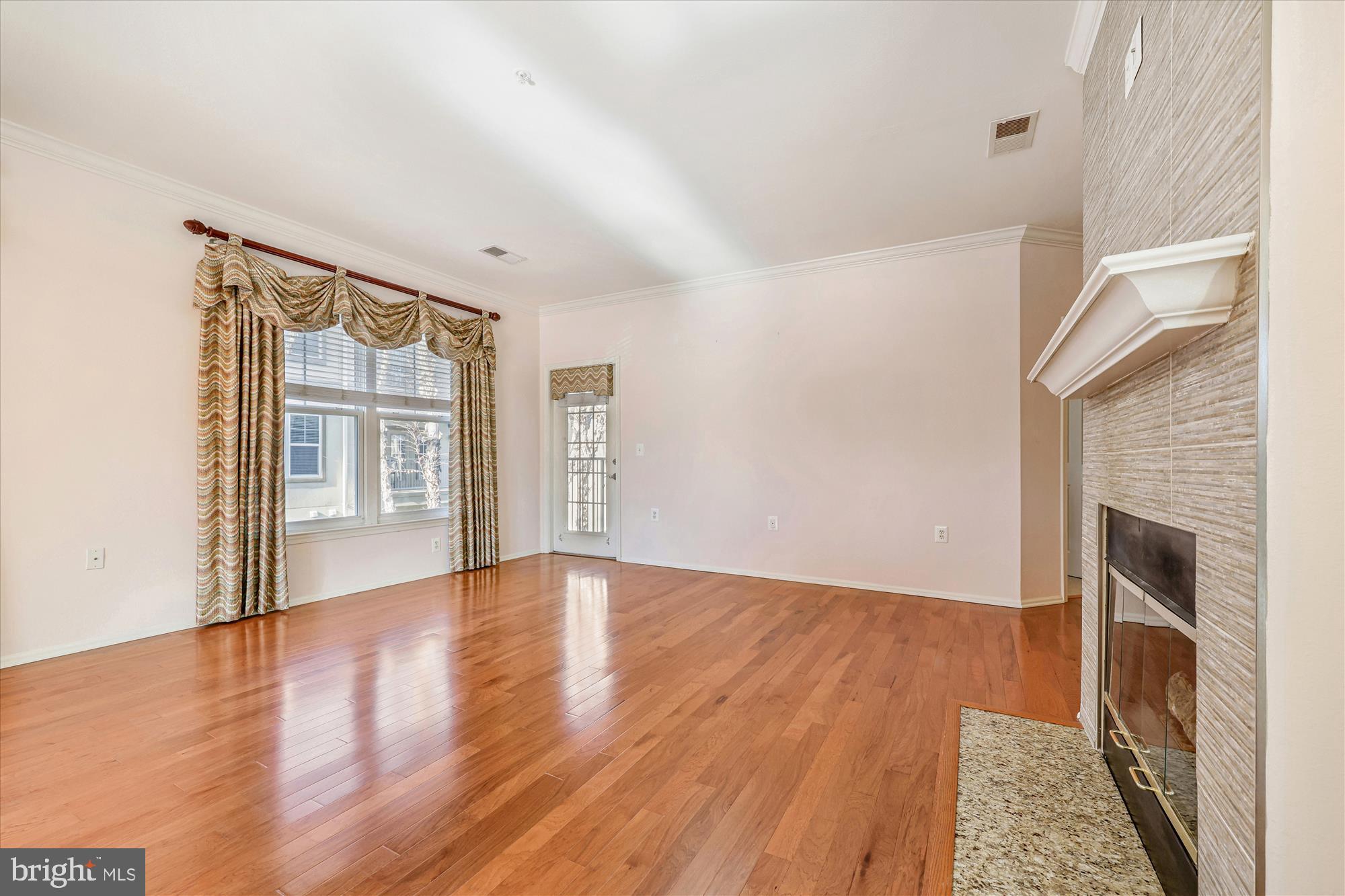 11800 Old Georgetown Road, Unit 1422 North Bethesda, MD 20852 - Photo 14 of 38 Living Room & Fireplace