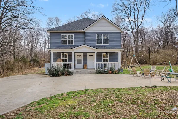 front view of a house with a yard