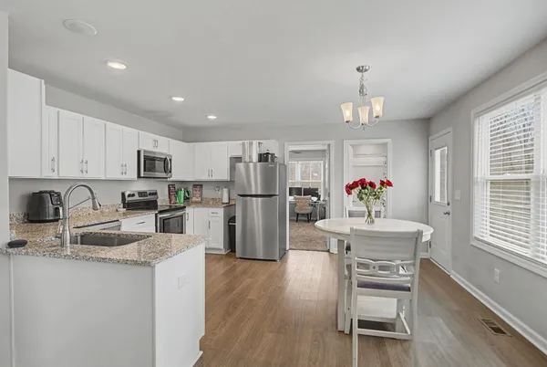 a bed room with a bed and a window