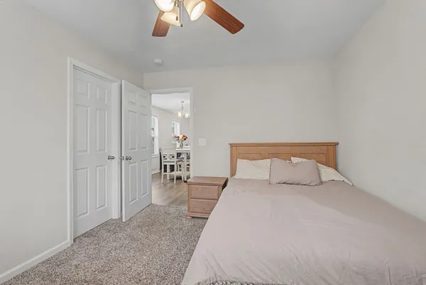 a bathroom with a sink a toilet and a shower