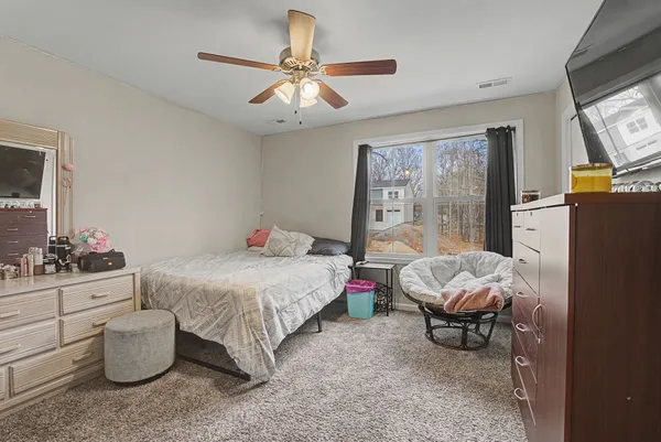 a front view of a house with fire pit