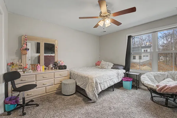 a view of a backyard of the house