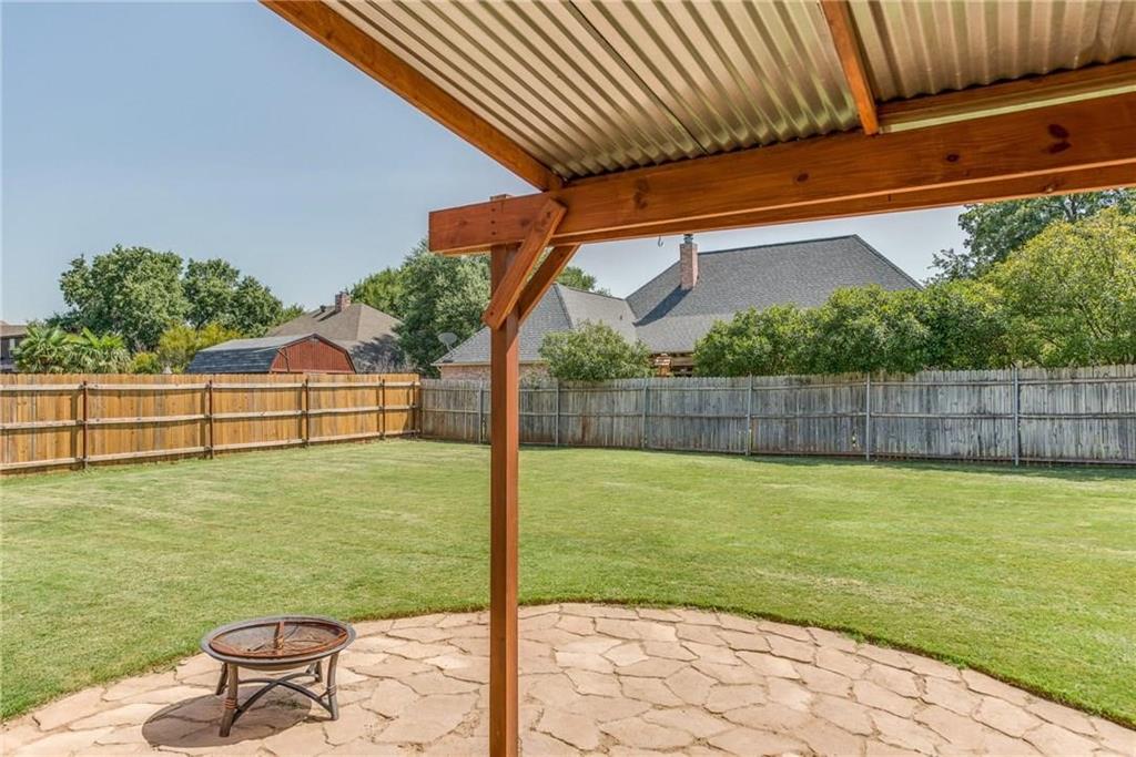 306 Howard Way Drive Aledo, TX 76008 - Photo 23 of 23 a view of a backyard with a swimming pool