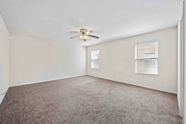 a view of an empty walk in closet