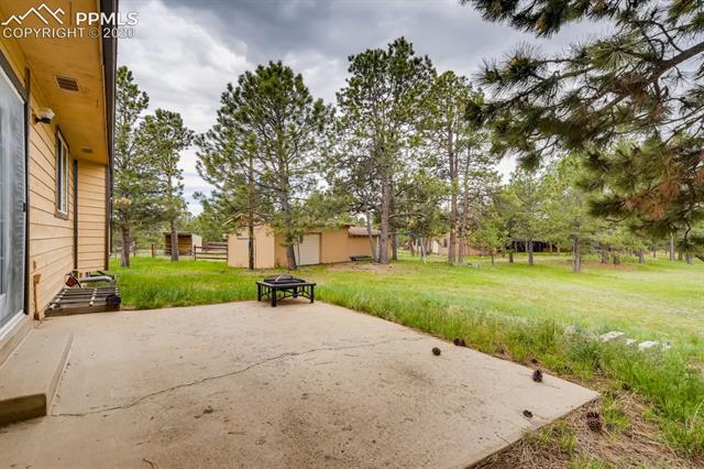 7575 Tobin Road Colorado Springs, CO 80908 - Photo 20 of 27 Back patio off of the family room