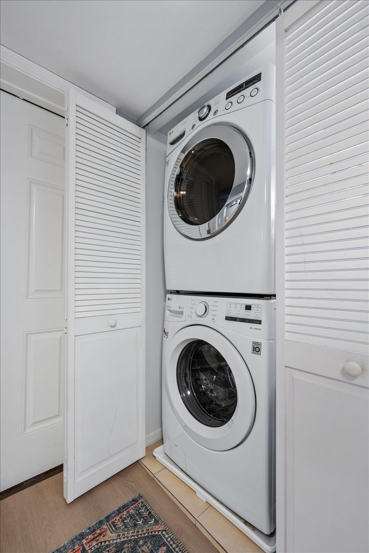 2215 Wesley Avenue Evanston, IL 60201 - Photo 36 of 52 a utility room with dryer and washer
