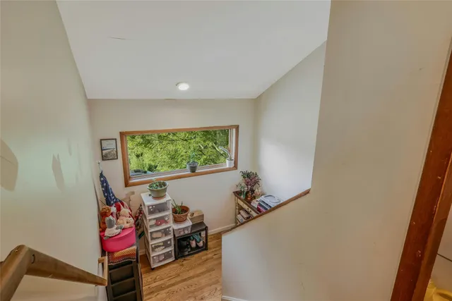 a room with furniture and a window