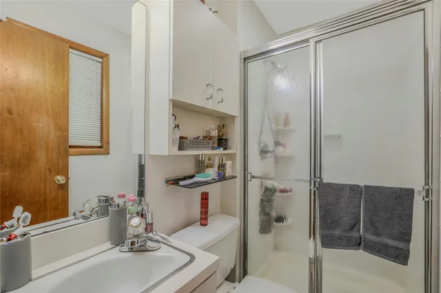 a bathroom with a bathtub and a sink