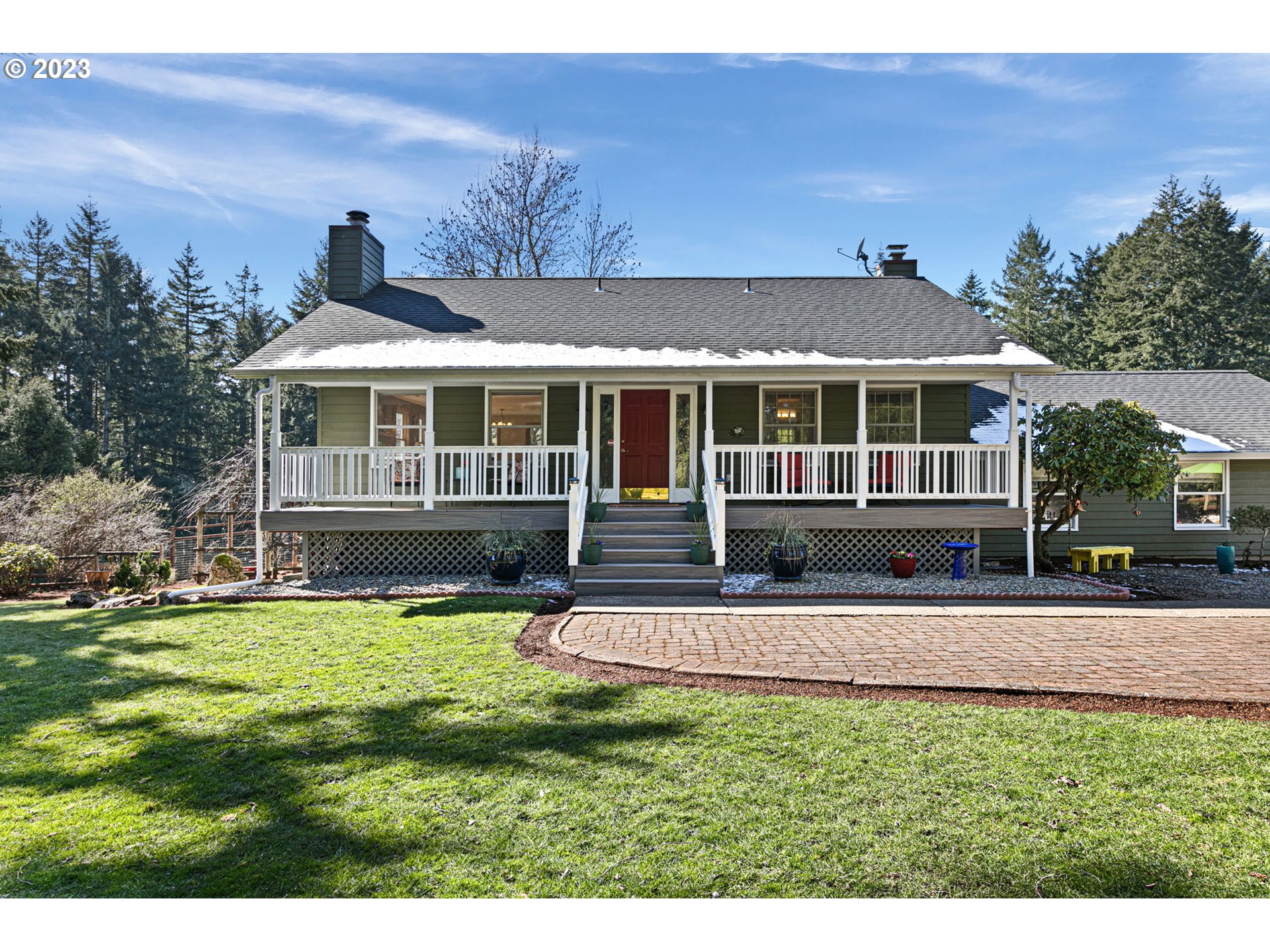 77914 Chisholm Trail Road Cottage Grove, OR 97424 - Photo 1 of 41 a view of a house with a yard