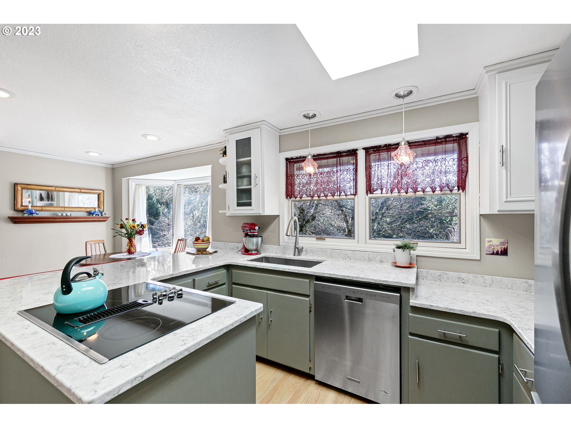 77914 Chisholm Trail Road Cottage Grove, OR 97424 - Photo 12 of 41 a kitchen with a sink stove and cabinets