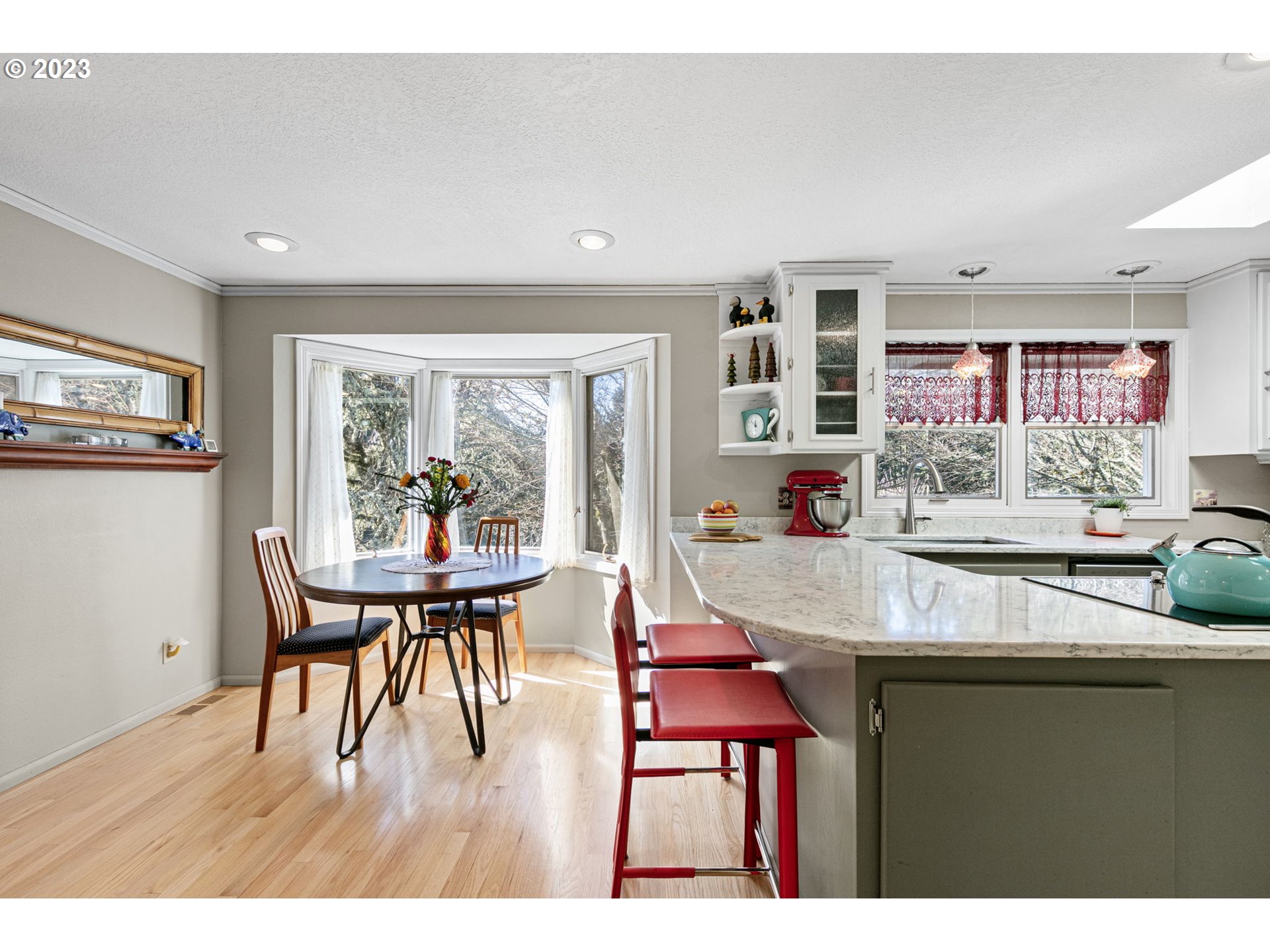 77914 Chisholm Trail Road Cottage Grove, OR 97424 - Photo 13 of 41 a view of a dining room with furniture and wooden floor