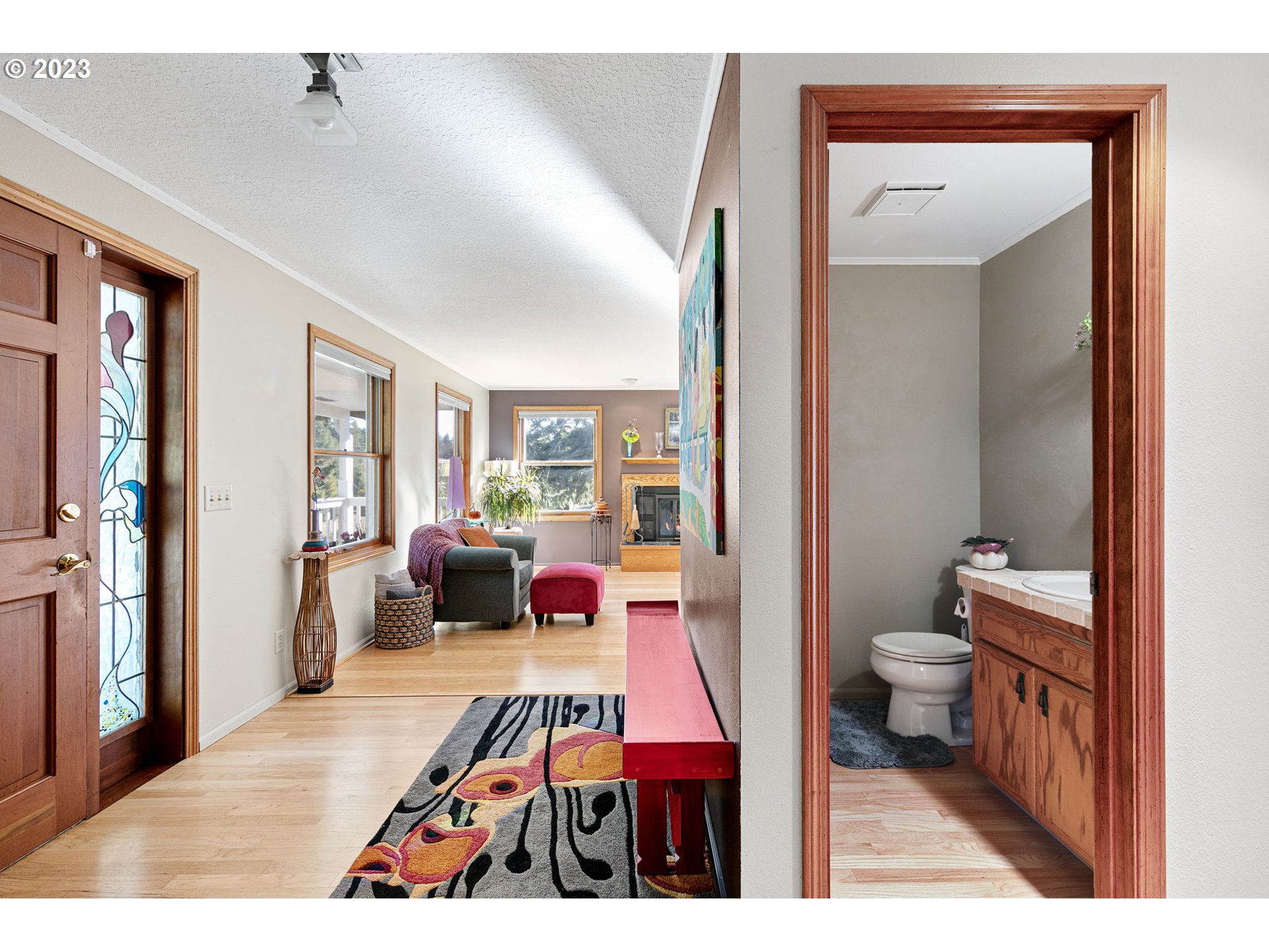 77914 Chisholm Trail Road Cottage Grove, OR 97424 - Photo 14 of 41 a living room with furniture and a wooden floor
