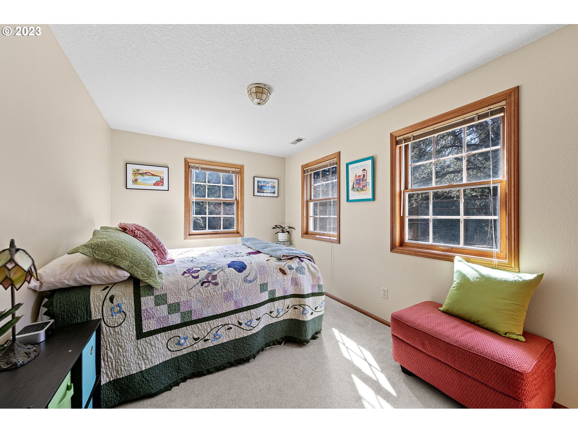 77914 Chisholm Trail Road Cottage Grove, OR 97424 - Photo 20 of 41 a bedroom with bed couch and window