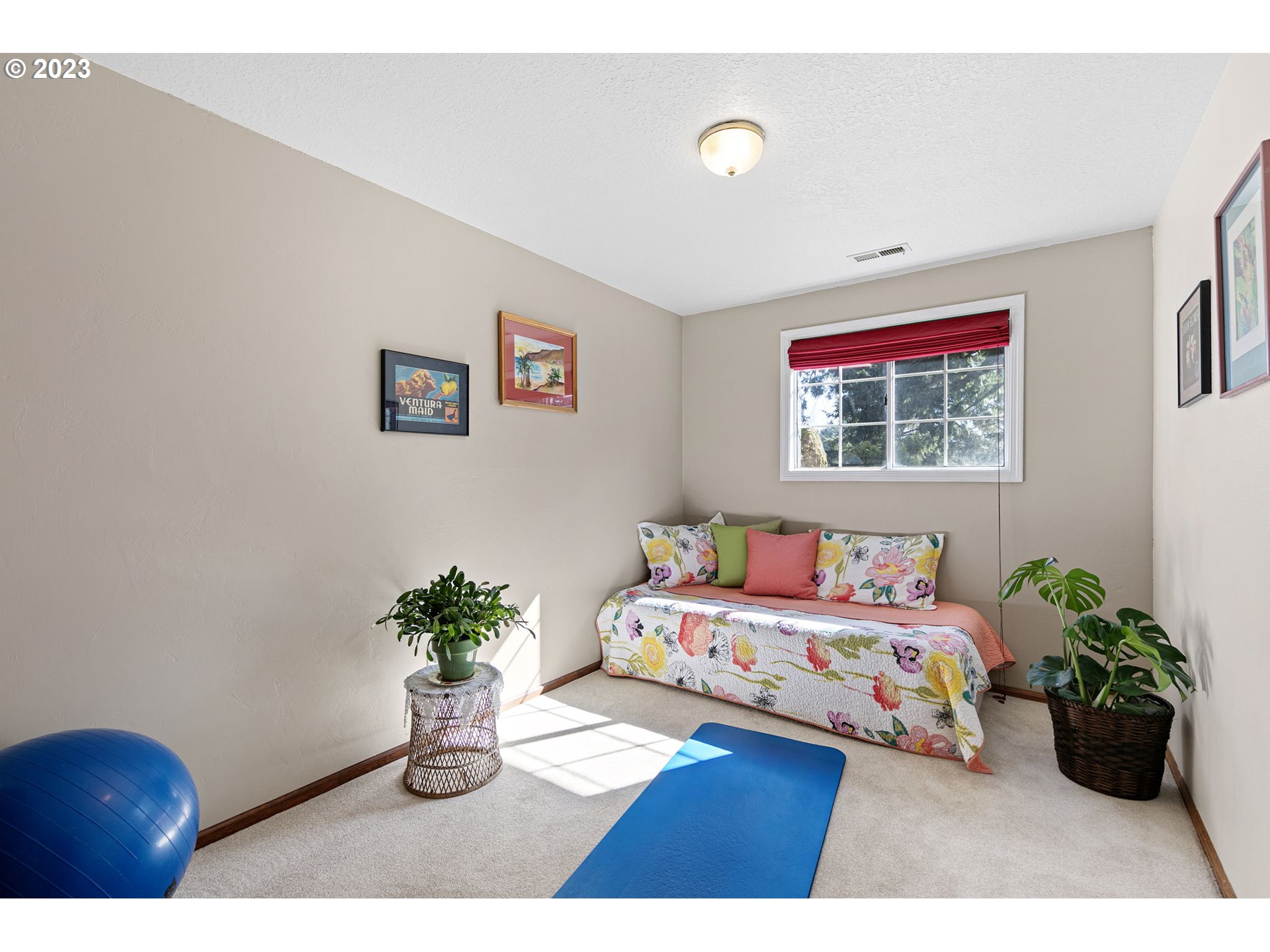 77914 Chisholm Trail Road Cottage Grove, OR 97424 - Photo 23 of 41 a bedroom with a bed and a painting on the wall