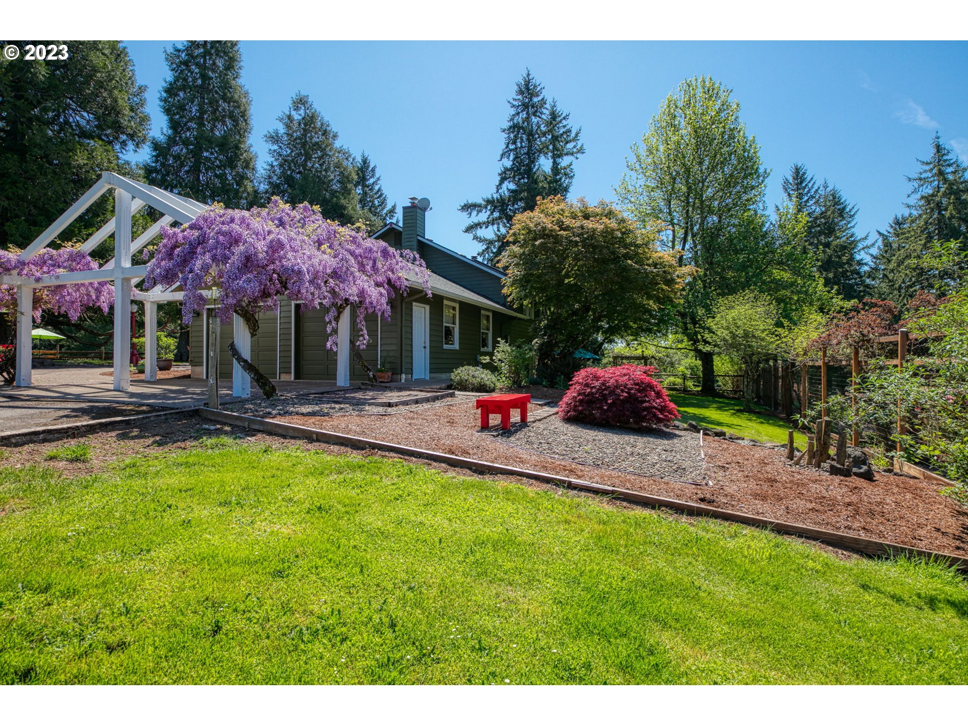 77914 Chisholm Trail Road Cottage Grove, OR 97424 - Photo 34 of 41 a childrens park with lots of swings and slides